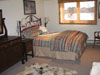 Master bedroom at Ruffed Grouse Lodge resort rentals in Phillips Wisconsin